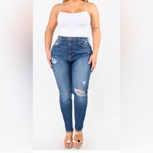 Plus size distressed jeans